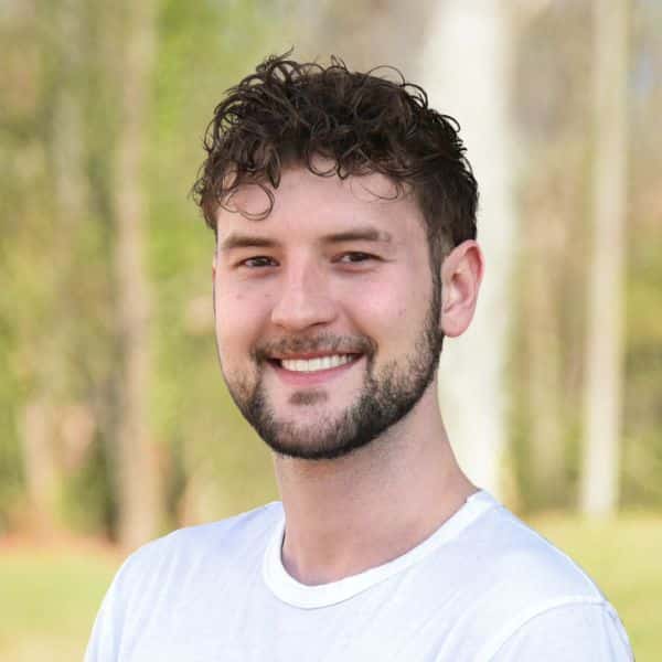 Bryan team photo smiling outside Smiling headshot bryan outside team