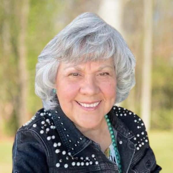 Gloria team photo smiling outside Gloria headshot outside smiling