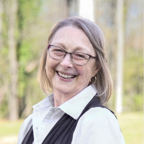 Mary team photo smiling outside