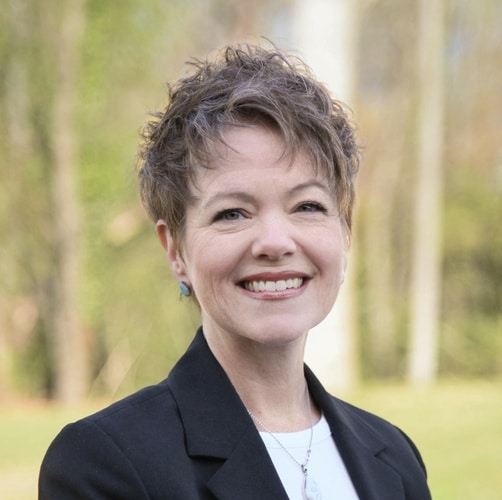 Mary team photo smiling outside