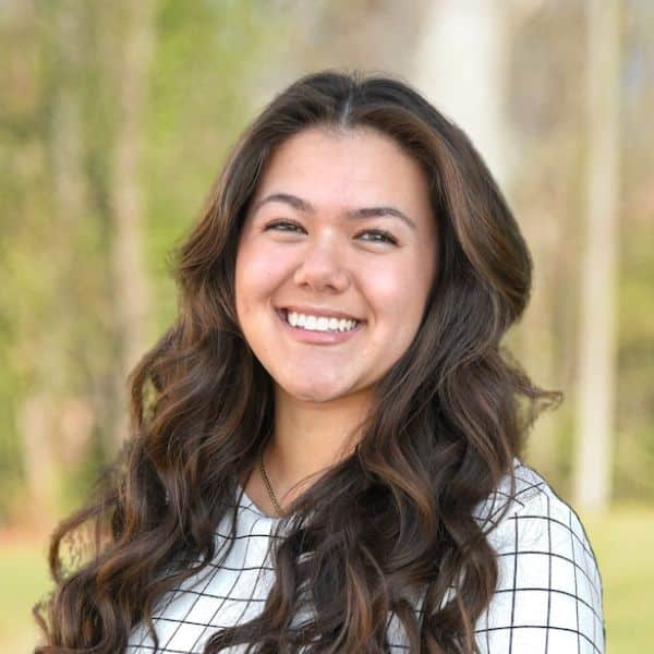 Maddy team photo smiling outside Team photo smiling outside maddy staff picture