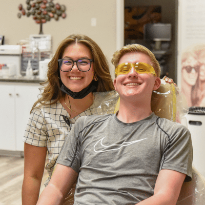 Orthodontics and breathing: the importance of correcting airway issues 7 Boy and girl patients smiling, representing orthodontics and breathing